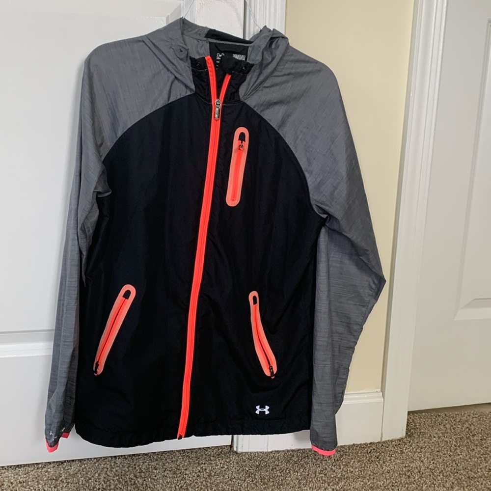 Under armors  women’s light weight rain jacket size medium